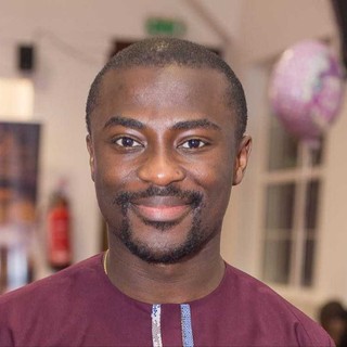 Olamide Olakanmi, Owner of Pool Pharmacy, headshot photo