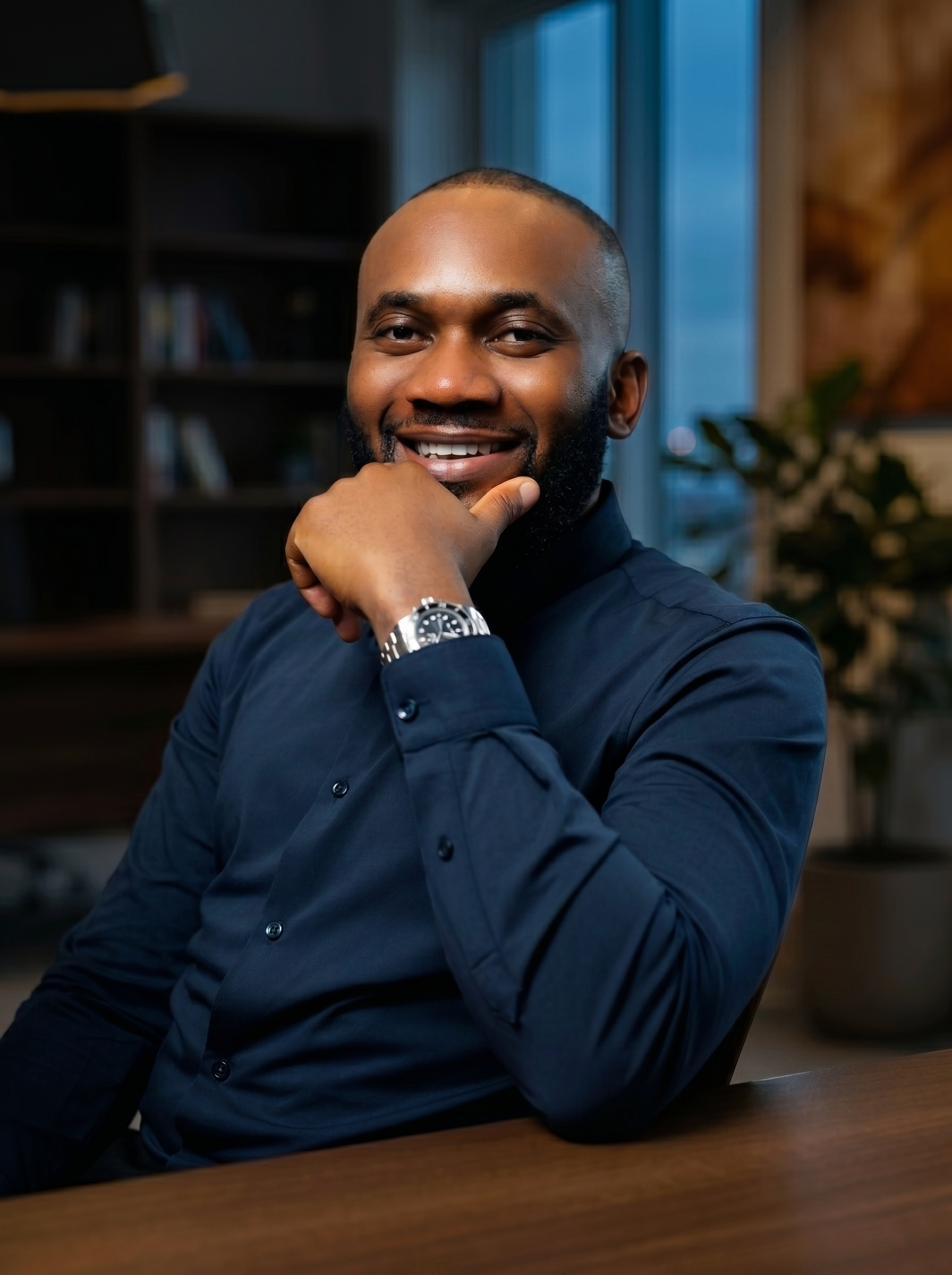 Solomon Abuede, founder of DOTA Consulting, smiling in a professional headshot